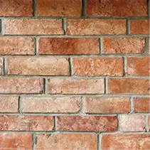 Close-up of warm terracotta brick pattern for luxury outdoor patio design and backyard construction