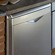 Modern stainless steel dishwasher installed in luxury kitchen cabinetry
